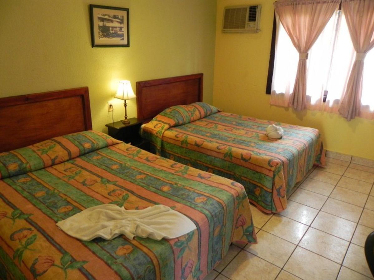 Hotel Puerto Libre ปวยร์โต บาร์ริโอส ภายนอก รูปภาพ